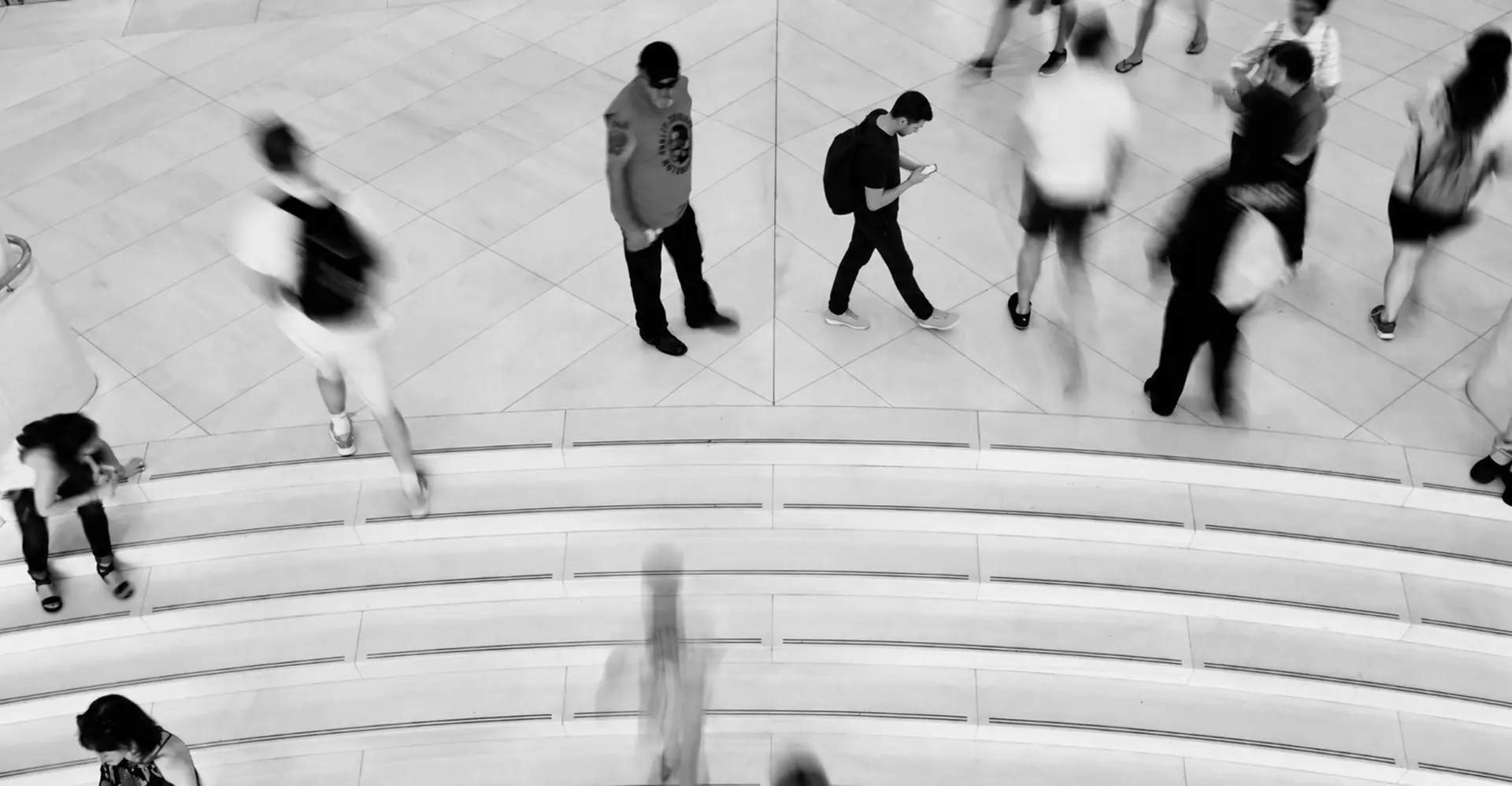 Busy crowd of people on the move, seen from above